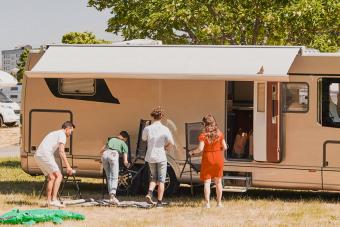 Family camping at trailer park 