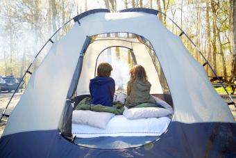 Kids inside camping tent