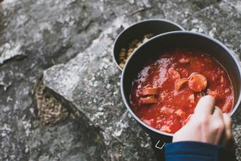 Person Preparing Beanie Weenie