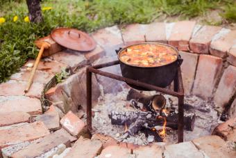 Slow cooking stew on wooden fire