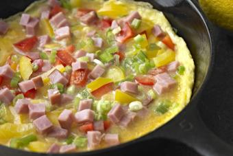 Omelette made of Ham and Vegetable in a Cast Iron Pan