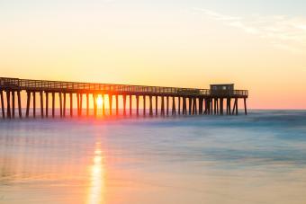 A morning sunrise with the newly extended fishing pier in Avalon, NJ.