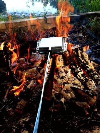 Cooking Food Over Campfire