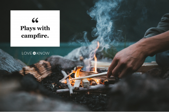 Man Sitting By Campfire