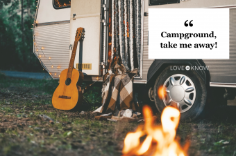Camper Van With Guitar And Fire Place Parking In Forest At Night