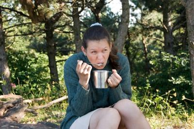 Women enjoying a well thought out camping meal plan.