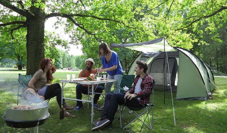 young adults out camping