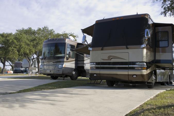 Two luxury motorhomes at RV park