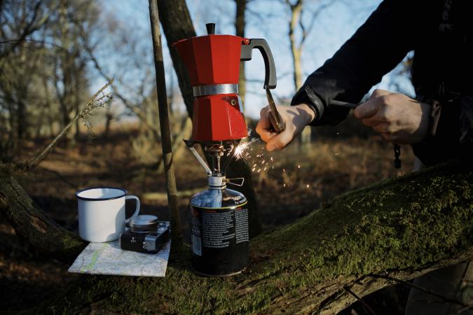 Igniting a camp stove