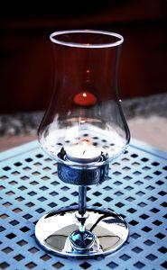 A teardrop candle holder accentuates the beauty of candlelight.