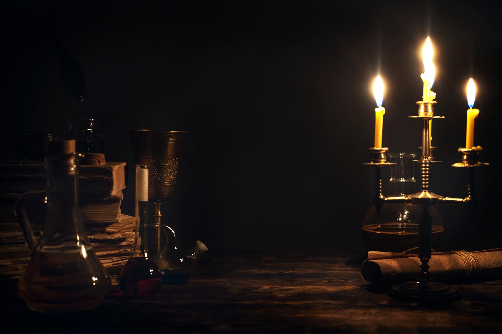 Alchemist table with yellow candles