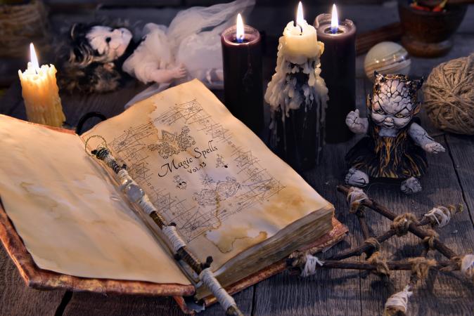 Black candles and white candles for spellwork