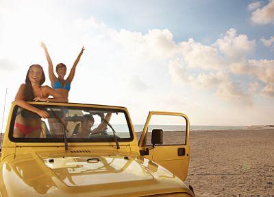 girls riding on a jeep
