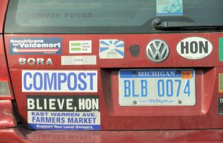 car with bumper stickers