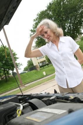 woman looking at car