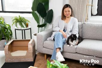 Woman on Couch with Cat