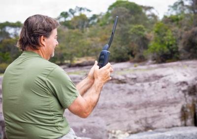 Man using satellite phone