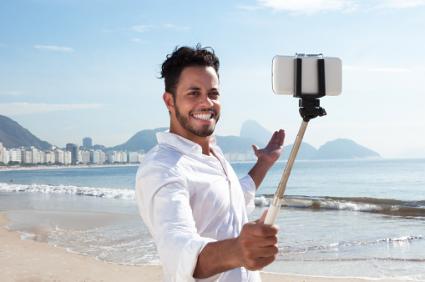 man with selfie stick