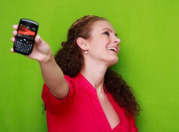 Woman showing off her BlackBerry