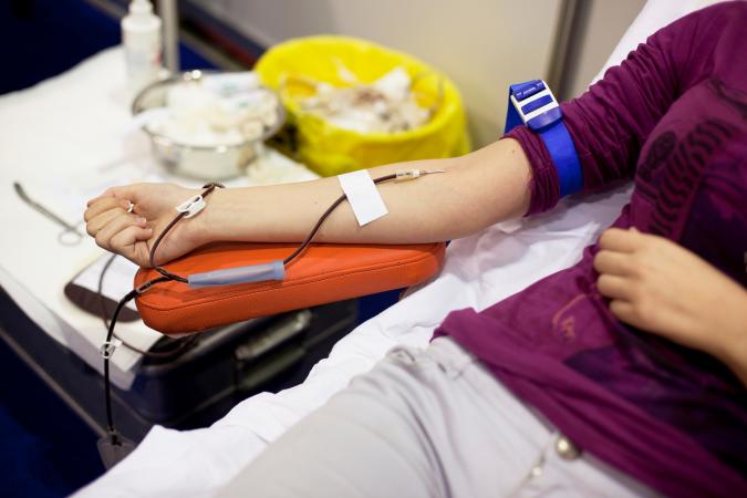 Young woman donating blood