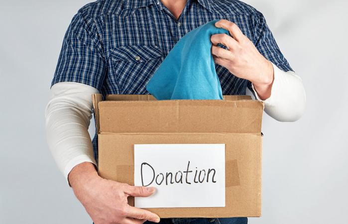 Man holding donation box