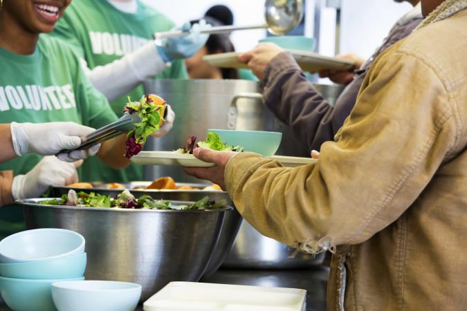 Volunteers working in soup kitchen