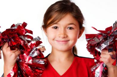 Young cheerleader wearing red
