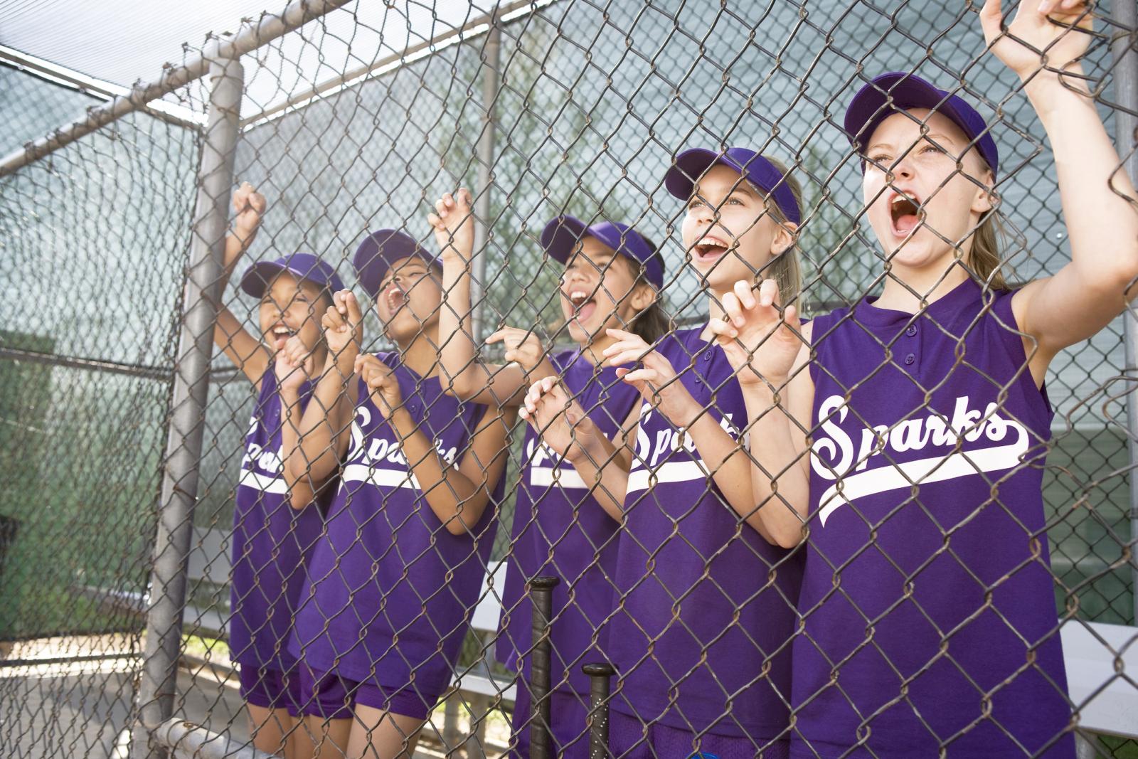 Girls cheering their team mates