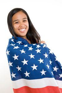 girl wrapped in flag