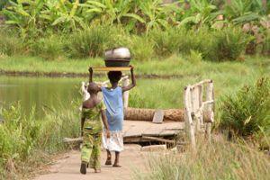 two African children on bridge