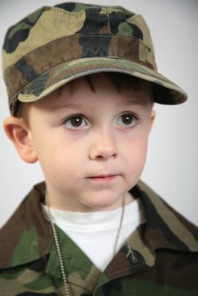 Toddler boy in USMC hat and shirt