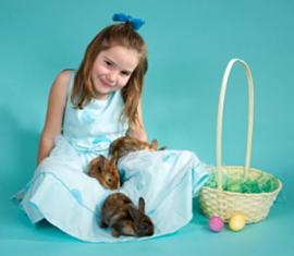 girl in dress with bunnies