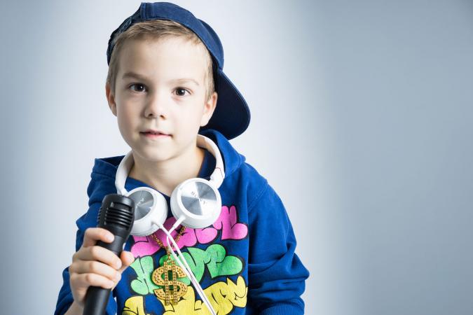 Boy with microphone and headphones