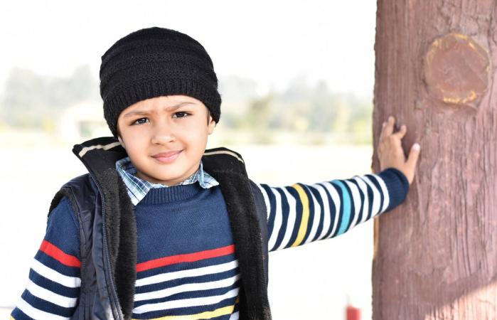 Boy Wearing Warm Clothing