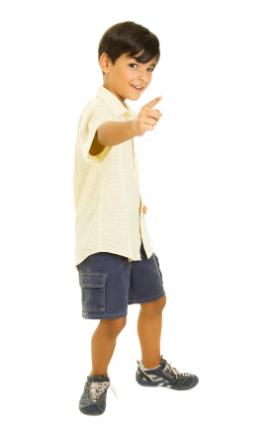 young boy in trendy clothes