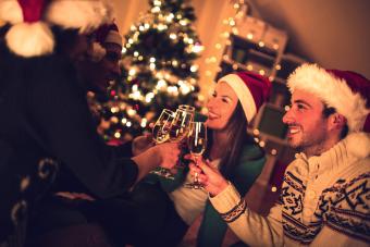 Friends celebrating Christmas with a toast