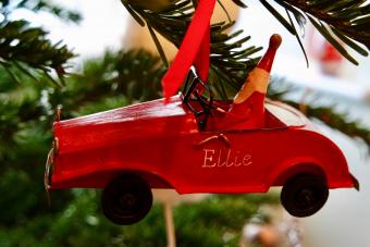 Santa driving car Christmas ornament