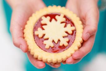 Girl holding Christmas cookie