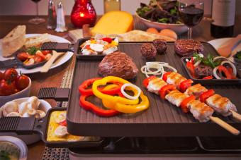 gourmetten table filled with ingredients