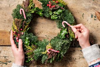 festive wreath with candy canes attached