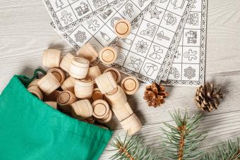 Wooden lotto barrels with bag and bingo cards 