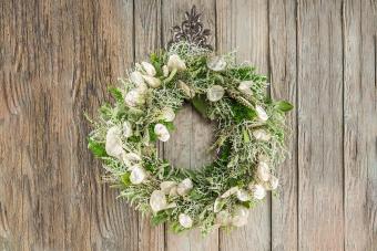 wreath on wooden wall