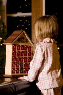 Girl looking at Advent calendar