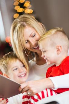 laughing family reading poem book