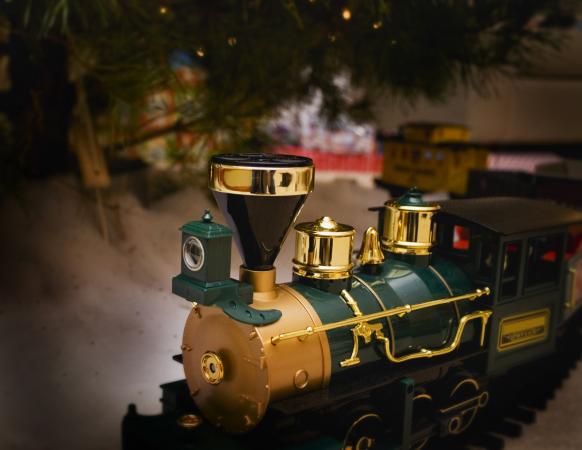 Train below Christmas tree
