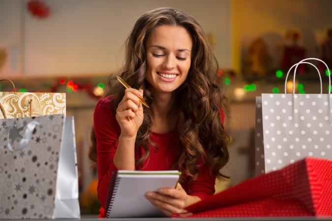 Woman checking Christmas listlist