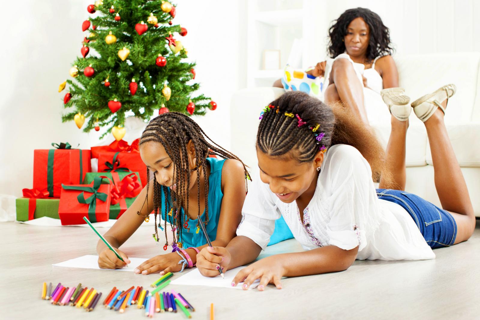 girls coloring at Christmas