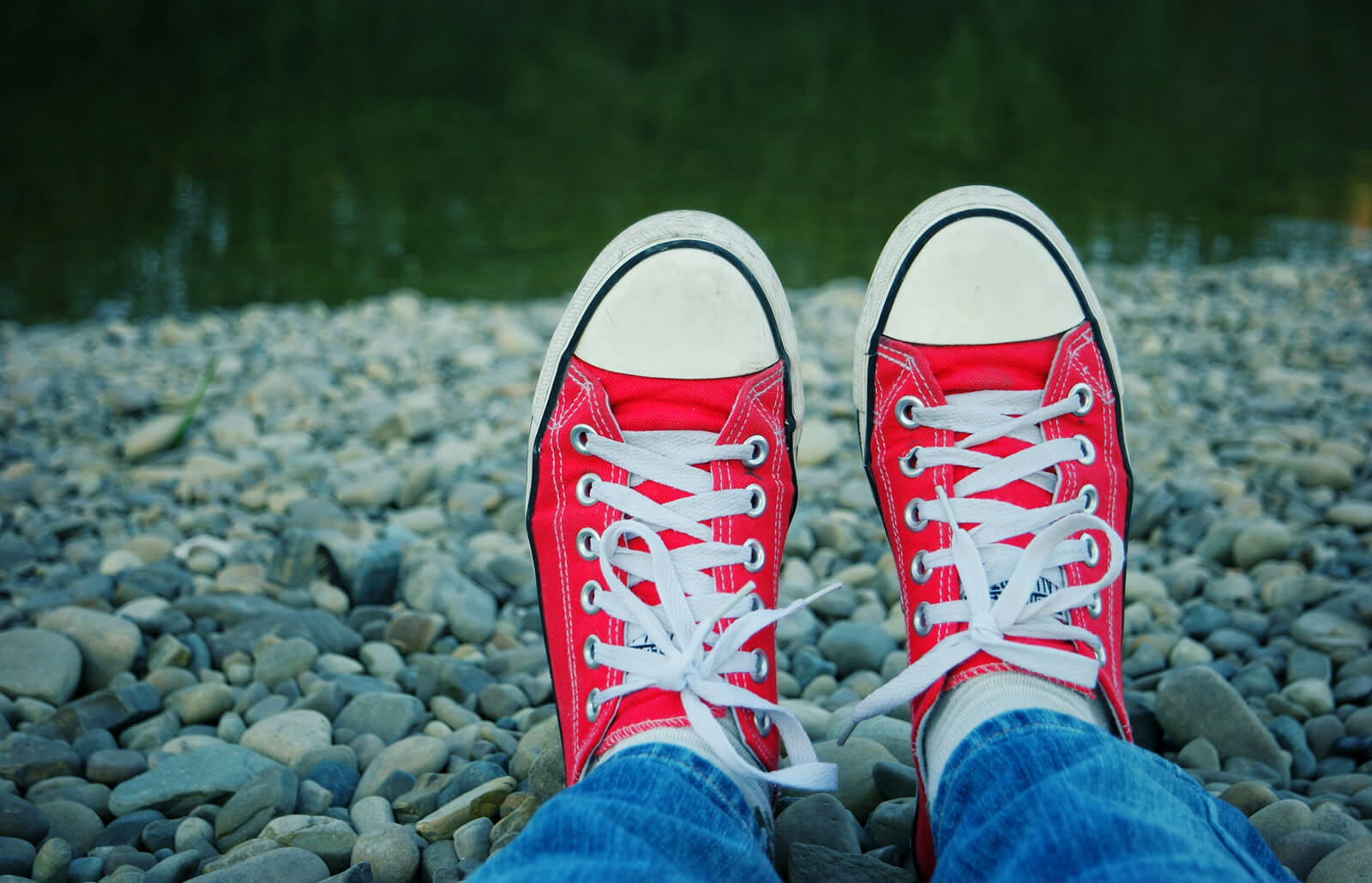 white shoelaces with red tips