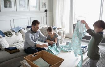 folding laundry in living room