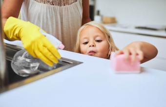 cleaning a kitchen surface together at home